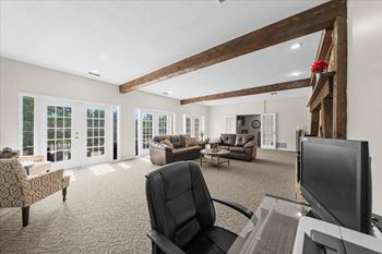 Living room with a desk and computer